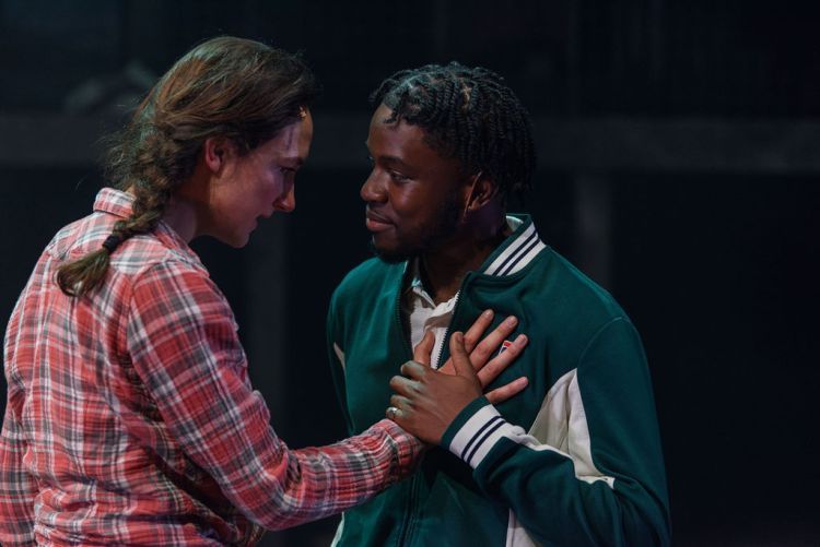 Nora Knop with her hand on Obadiah's chest
